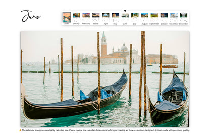 June Image Gondolas floating on the still waters of the Grand Canal in Venice, Italy, with St. Mark's Basilica in the background.