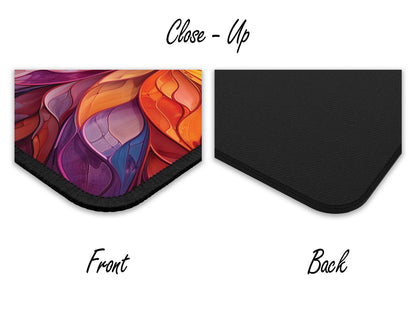 Close-up of a gaming mouse pad corner with an anime kingdom design, highlighting the fine print quality and texture.