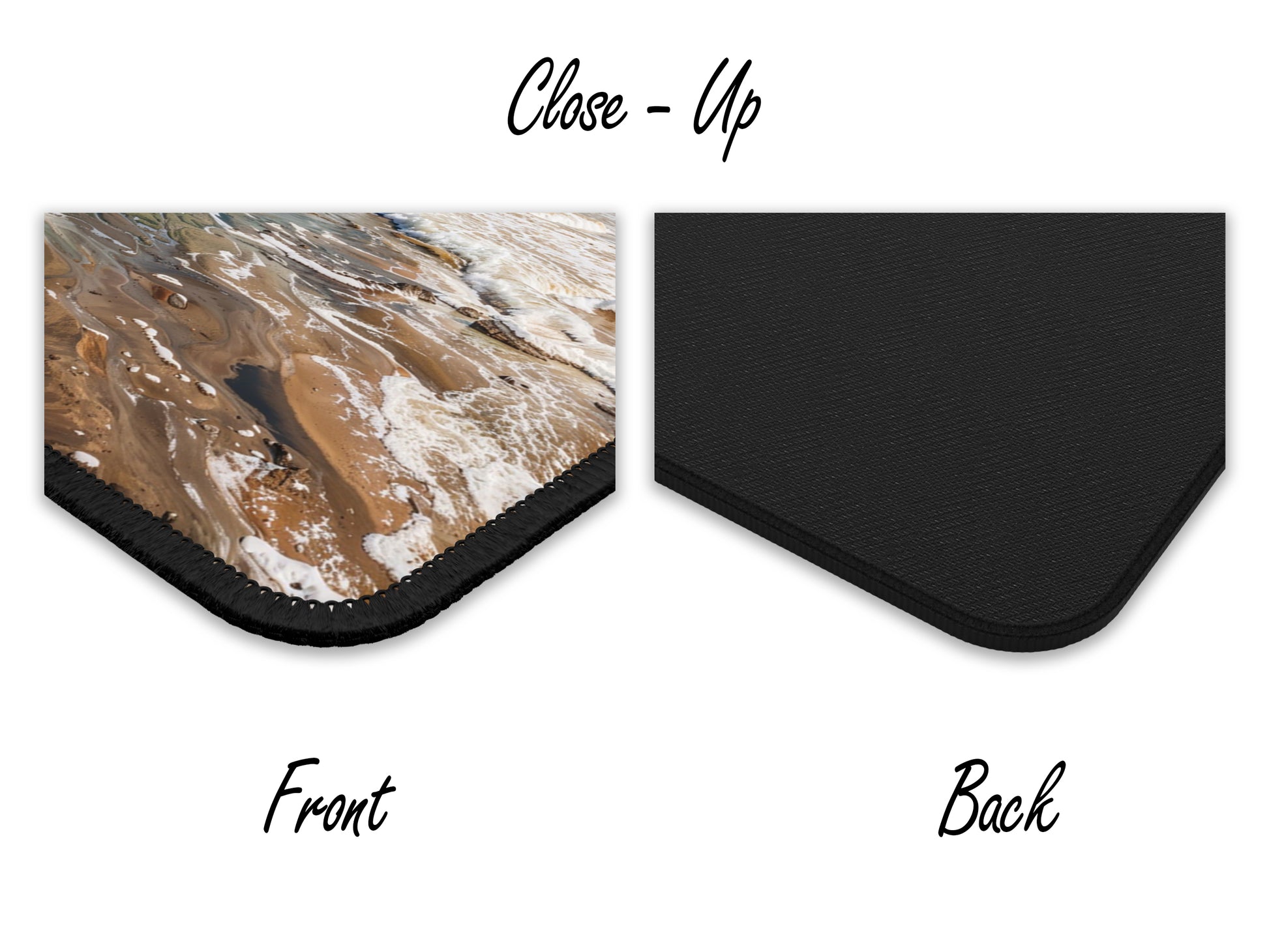 Close-up of the gaming mouse pad illustrating the detailed coastal scenery and quality edge stitching, juxtaposed with the solid black back.