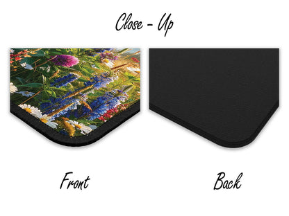 Close-up of the gaming mouse pad showing the fine detail on the front with a rich, vibrant wildflower scene and the non-slip black rubber backing.