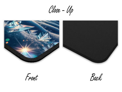 Close-up of the mouse pad showing the detailed texture and design quality on the front and a plain black rubber texture on the back.