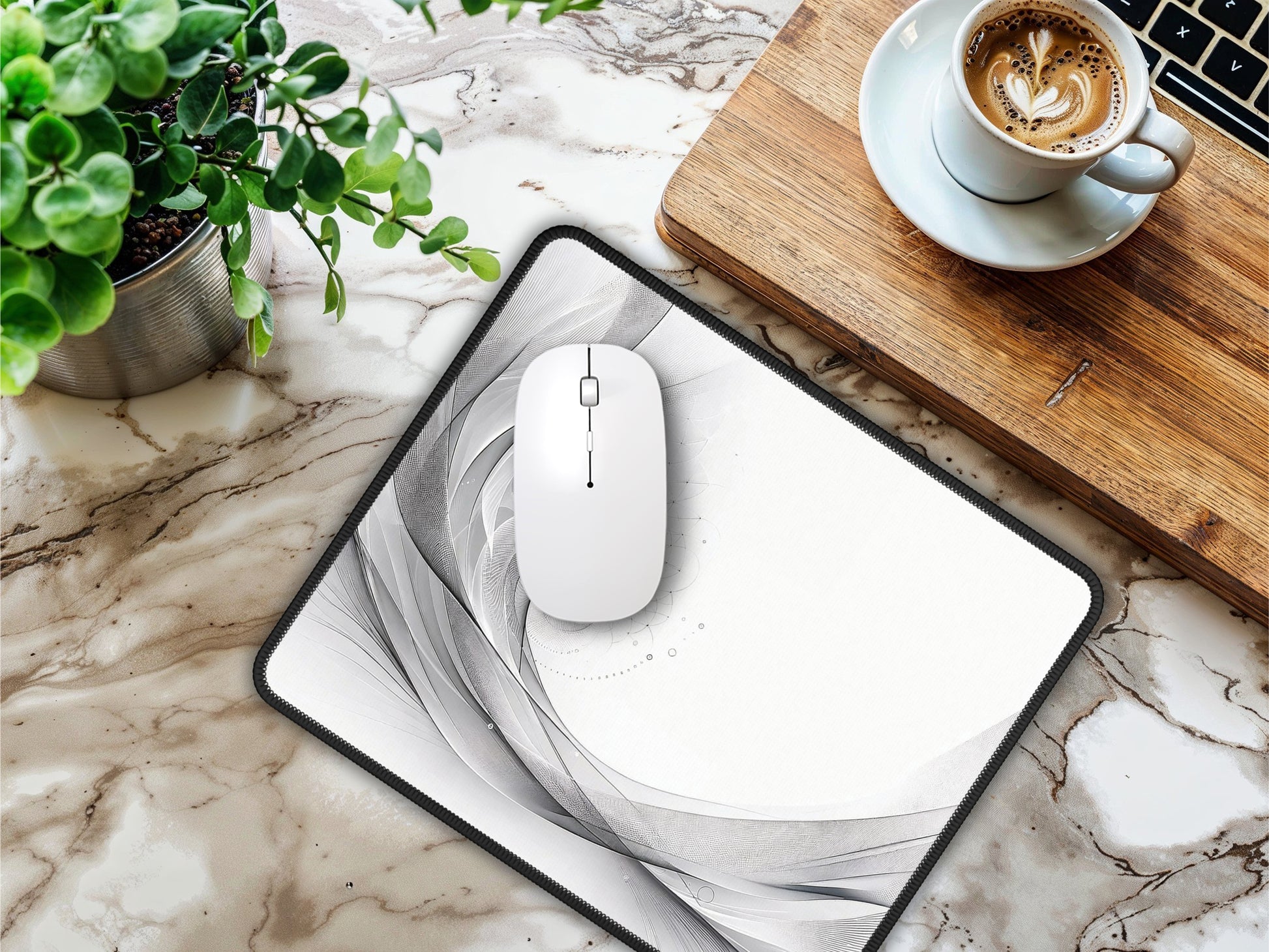 Mouse pad with a sophisticated monochrome swirl design on a marble tabletop, complemented by a white mouse and latte art.