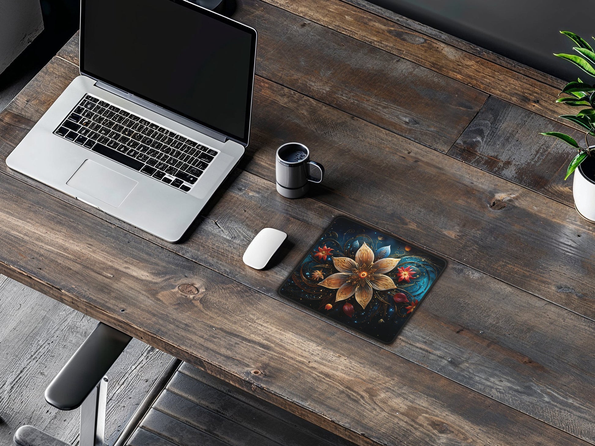 Rustic wooden desk setup showing the Celestial Bloom Mouse Pad with a modern laptop, white mouse, and a cup of black coffee.