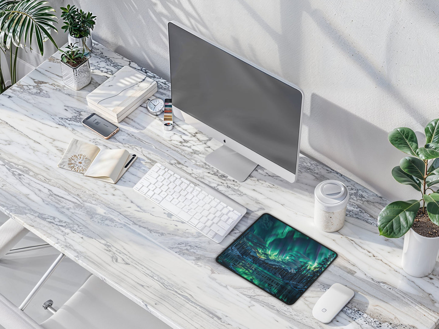 Rustic wooden table with the Alaskan aurora mouse pad, adding a touch of natural wonder to the work area.