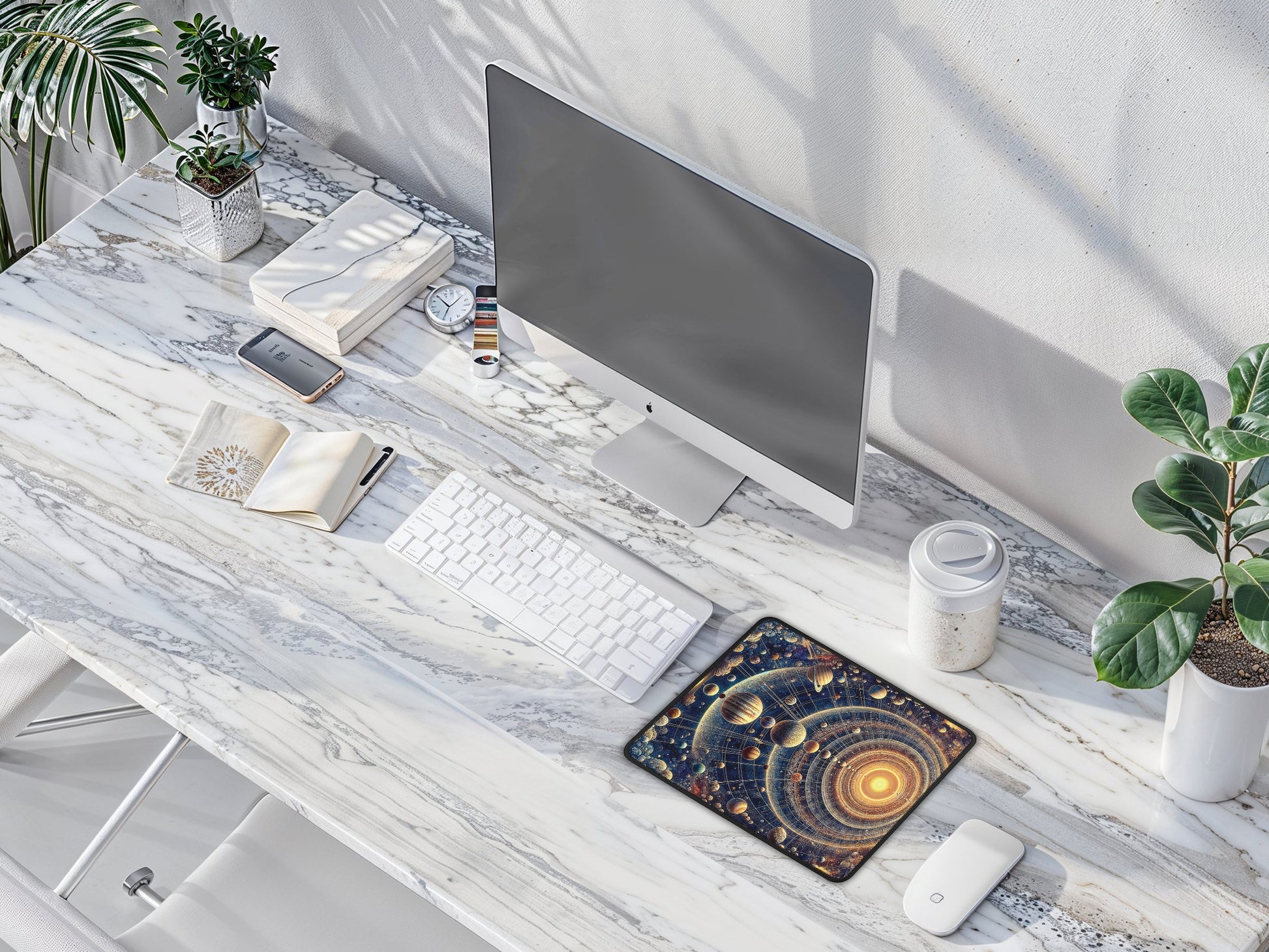 Bird’s-eye view of the Galactic Symphony mouse pad on a minimalist work desk, providing an expansive universe for the users mouse to explore.