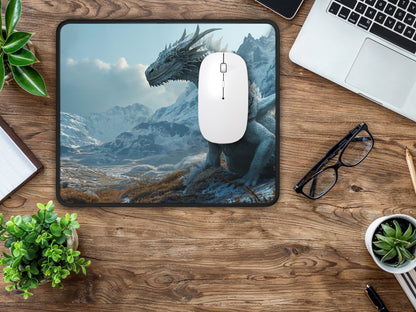 The Winter Dragon mouse pad seen in close proximity to office tools, providing an escape to a mythical world during work hours.