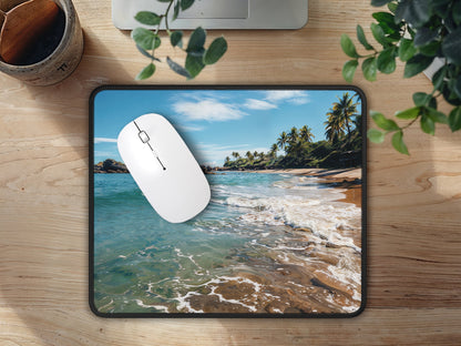 The Thai Retreat mouse pad on a natural wood surface, with the vibrant beach scenery providing a peaceful backdrop for both work and play.