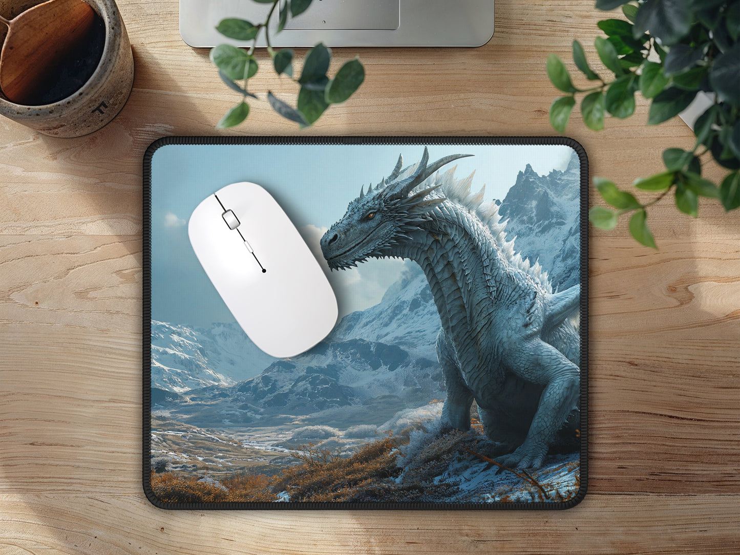 The mouse pad, adorned with the powerful Winter Dragon, serves as a statement piece in a workspace, blending imagination with functionality.