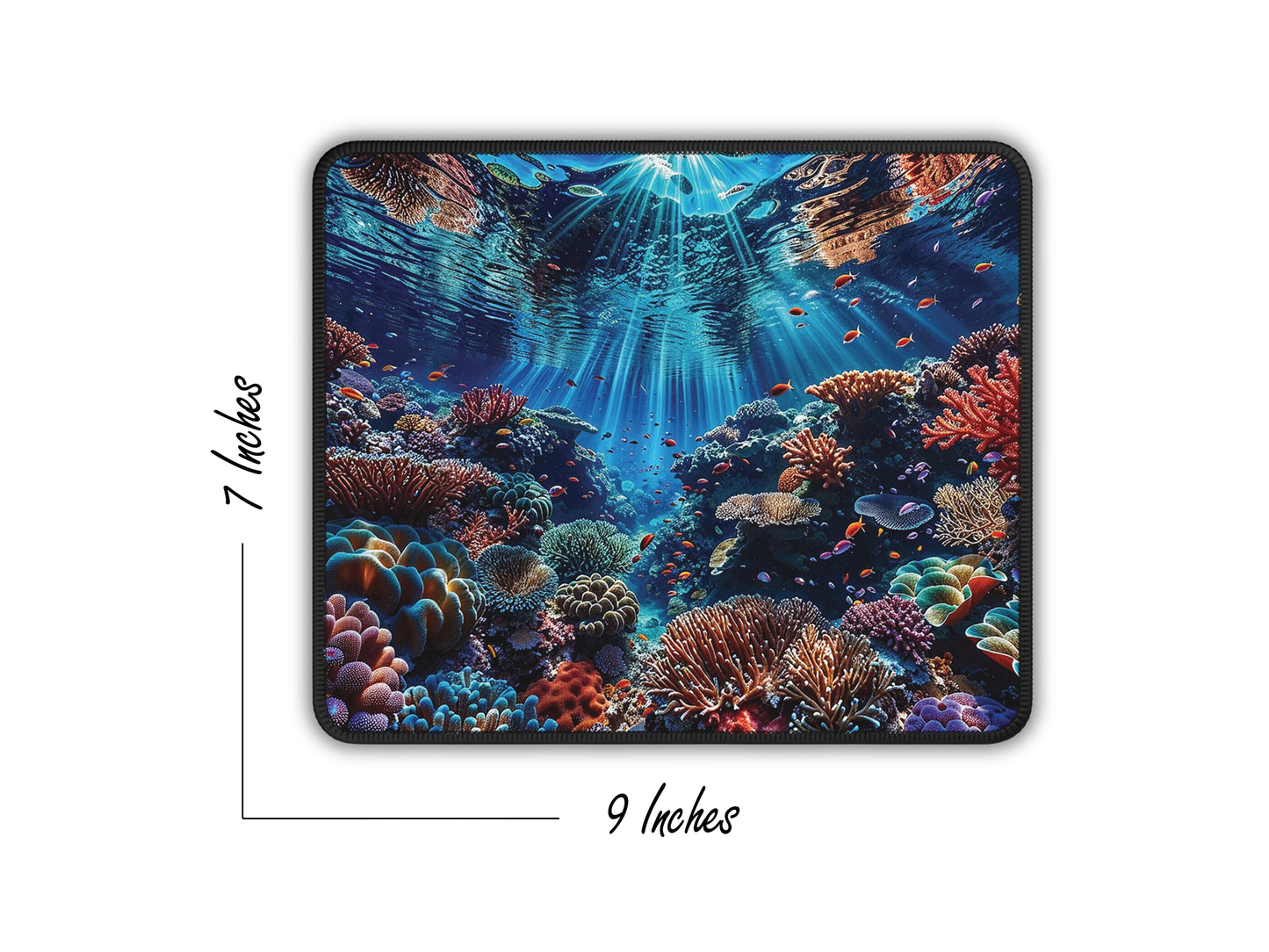 Top view of a mouse pad featuring a detailed underwater coral reef ecosystem, dimensions shown as 9x7 inches.