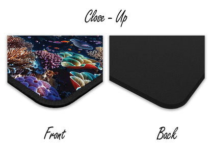 Close-up of the coral reef mouse pad highlighting the vivid colors and textures on the front and its sturdy black back.