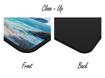 Close-up of the gaming mouse pad showing the detailed print quality of the Thai beach image and the robust black stitching.