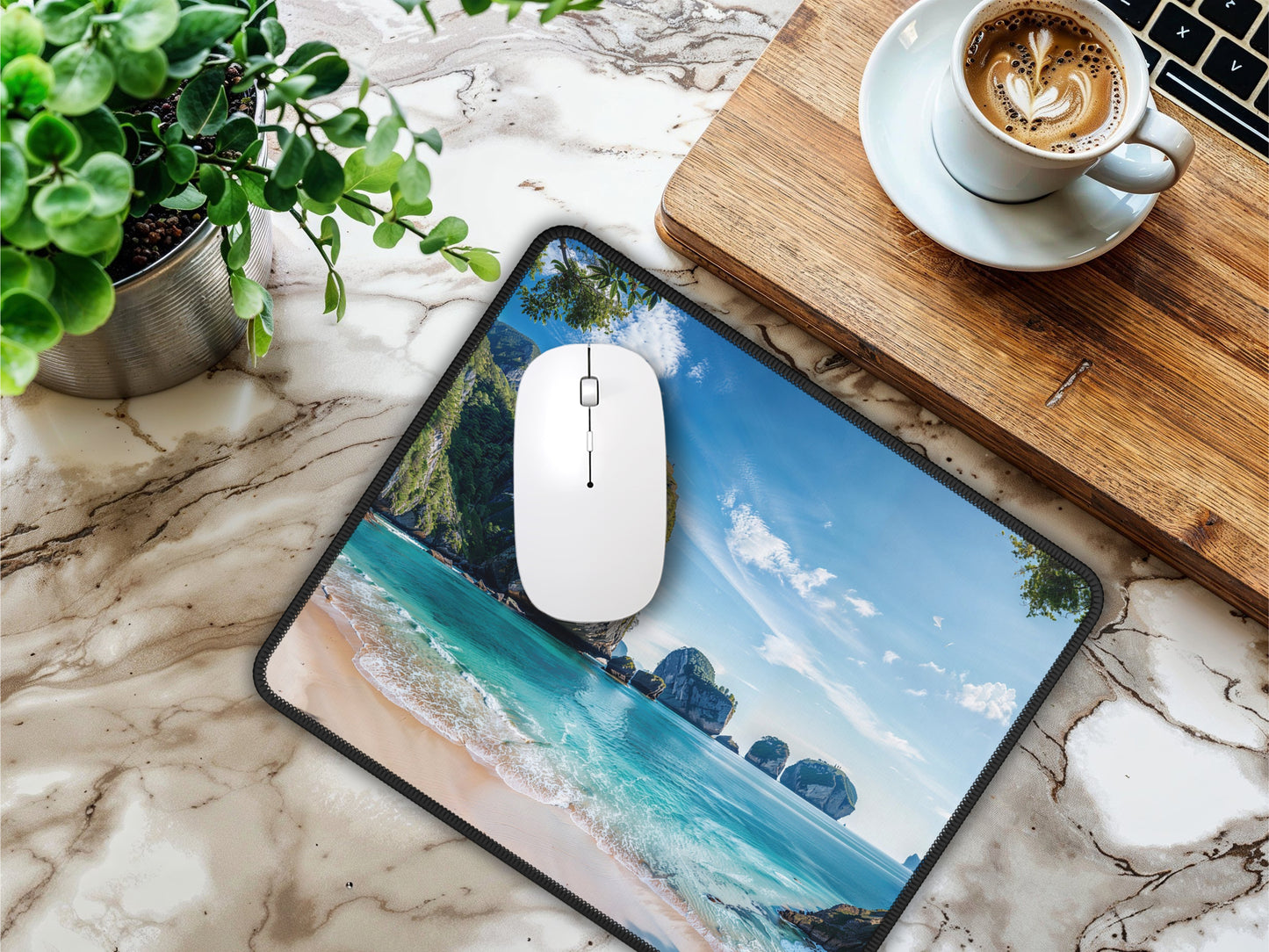 Elegant office setup with the Thai beach mouse pad on a marble desk, next to a coffee cup, enhancing the workspace with its serene beach vibes.