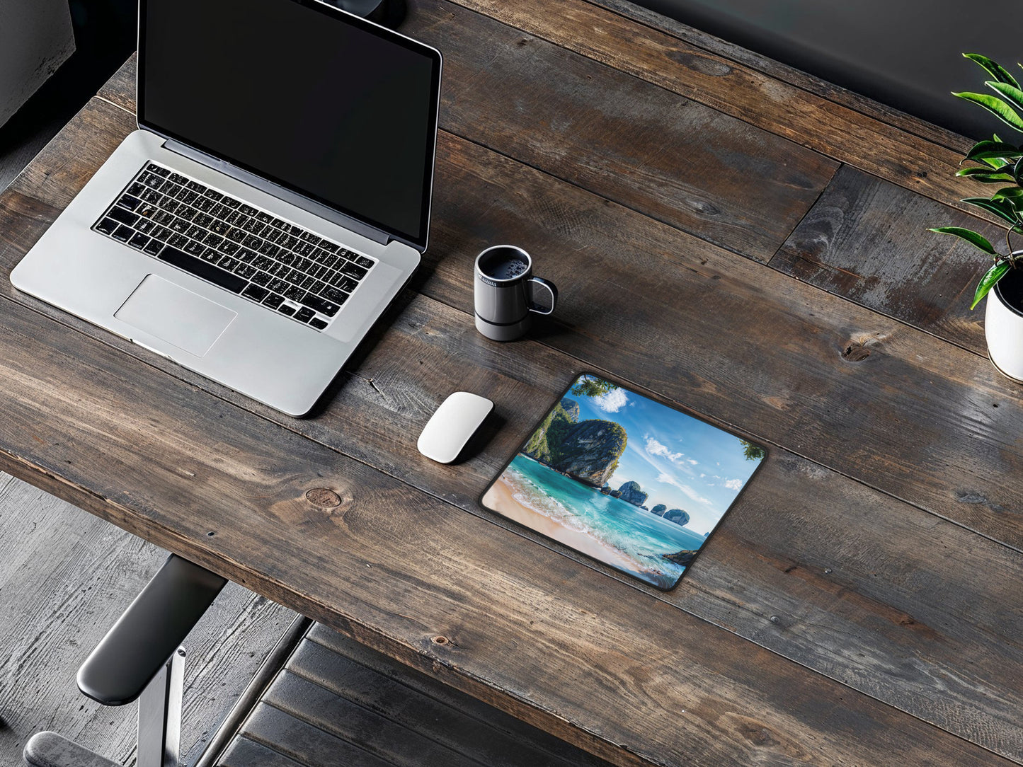 The mouse pad with a picturesque Thai beach scene on a wooden surface, providing a large, smooth area for mouse movement.