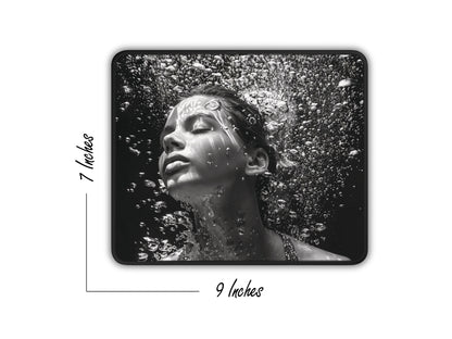 Mouse pad measuring 7 by 9 inches, featuring a monochrome underwater portrait.